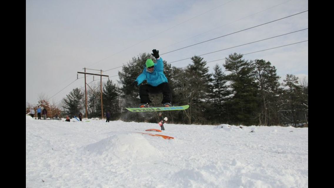 men doing jump on snowboard